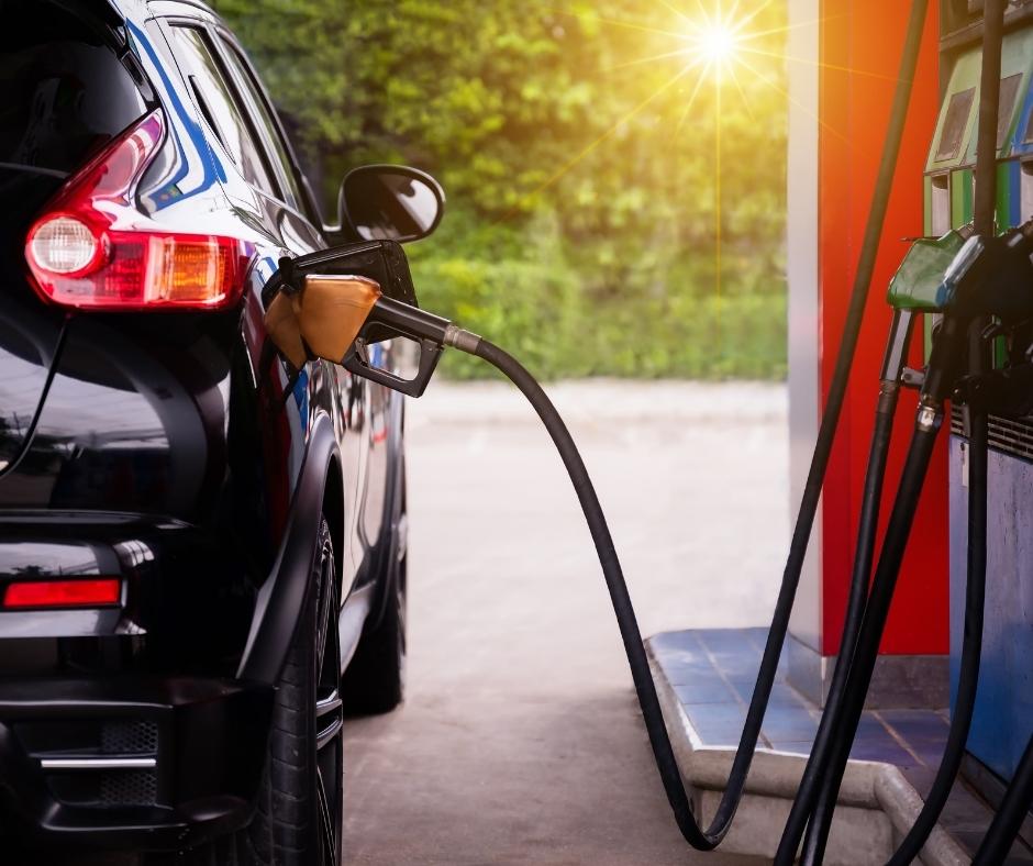 Car filling up at a gas station