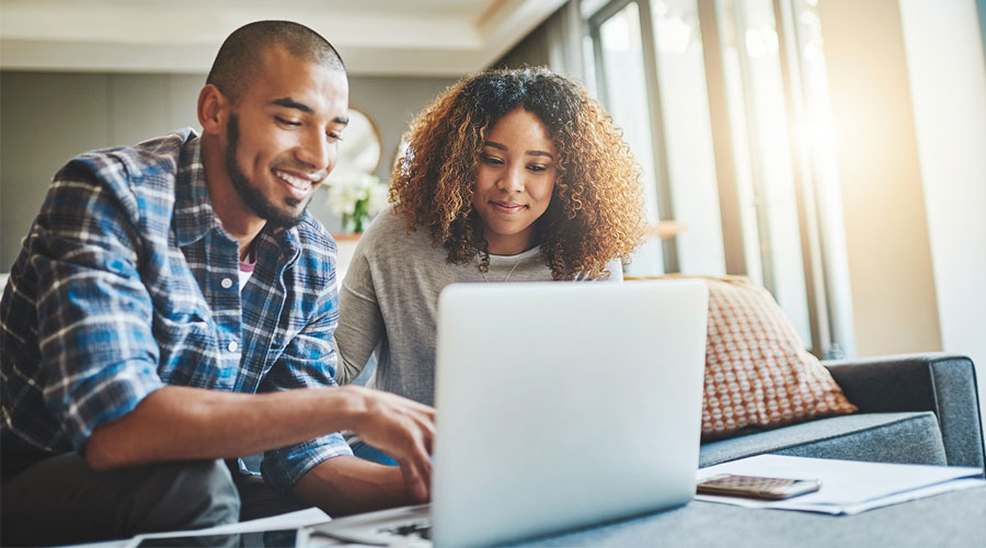 couple looking at computer