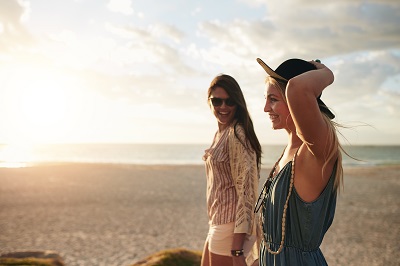 friends walking on beach