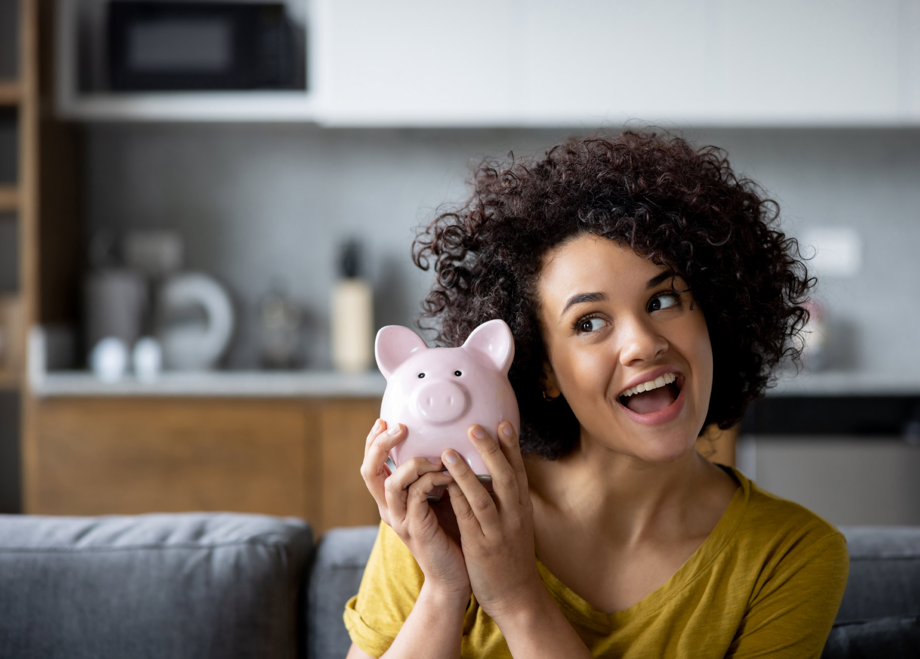 Woman with piggy bank 1395273085
